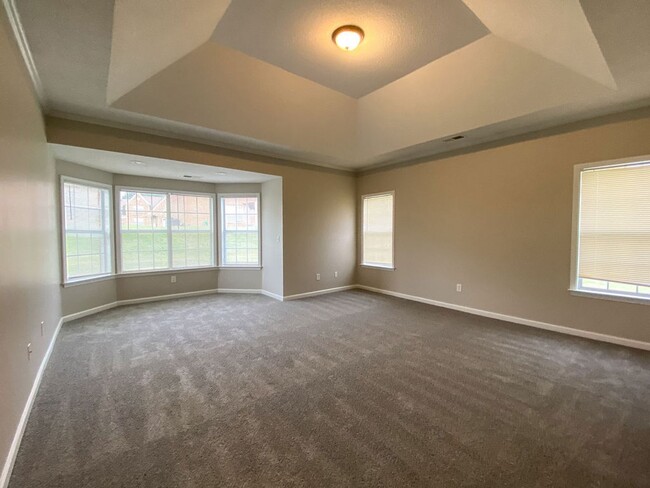 Building Photo - 5 Bedrooms with Bonus, 4 Bath Near Riverda...