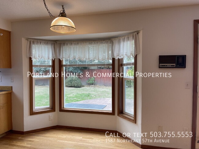 Building Photo - 1587 NE 57th Ave