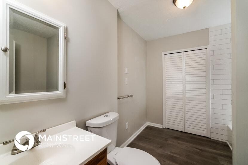 Building Photo - 1303 Woodcreek Dr