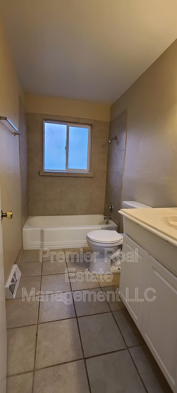 Building Photo - 6415 E 36th Ave