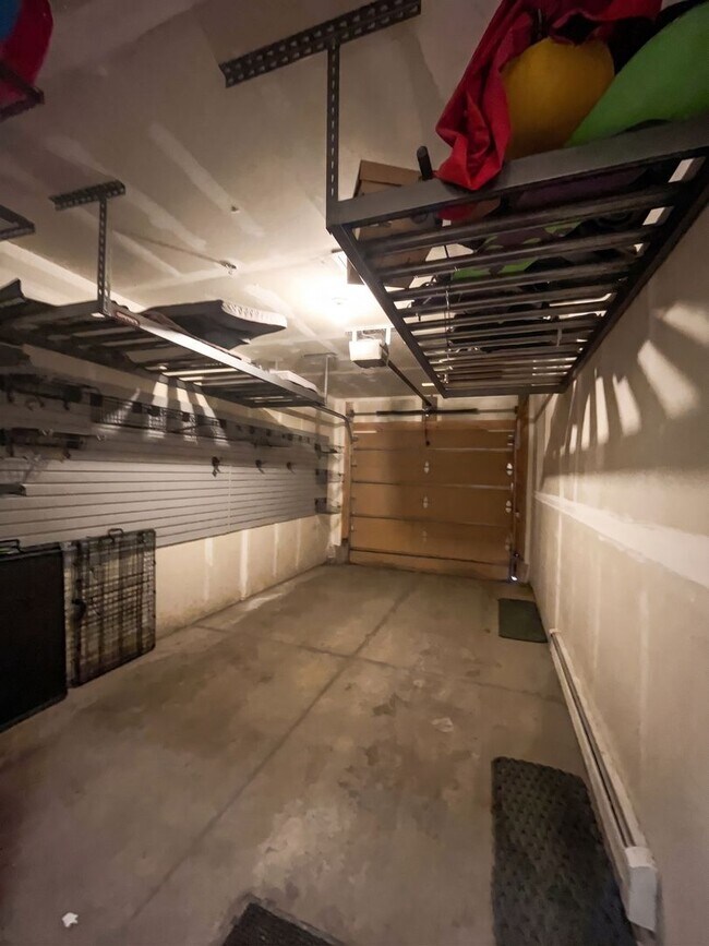 Building Photo - Two-Bedroom Condo with Attached Garage, Available Now