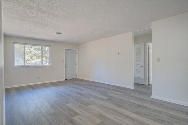 Building Photo - Stunning 4BR/2BA Pensacola Home with Private Pool, Modern Kitchen, Luxury Vinyl Flooring, Fully F...