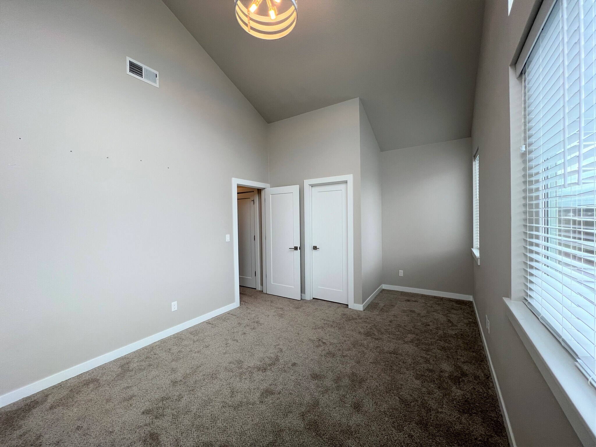 Front Bedroom with AMAZING Vaulted Ceilings and Two Story Windows - 12428 SW 171st Ter