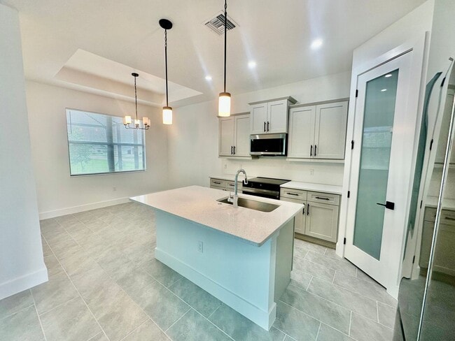 Building Photo - Brand New Construction Home in NE Cape Coral with a Pool on a Corner Lot