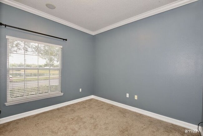 Building Photo - Luxurious 4/3 Waterfront Home with an In-ground Spa, an In-law Suite and a 2 Car Garage in the Hi...