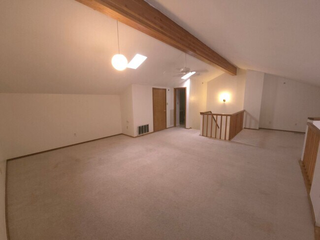 Building Photo - AVAILABLE NOW! 2 Bedroom Plus Loft with co...