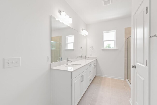 Building Photo - Welcome home to this stunning brand-new townhome in one of Indian Trail's newest and most desirab...