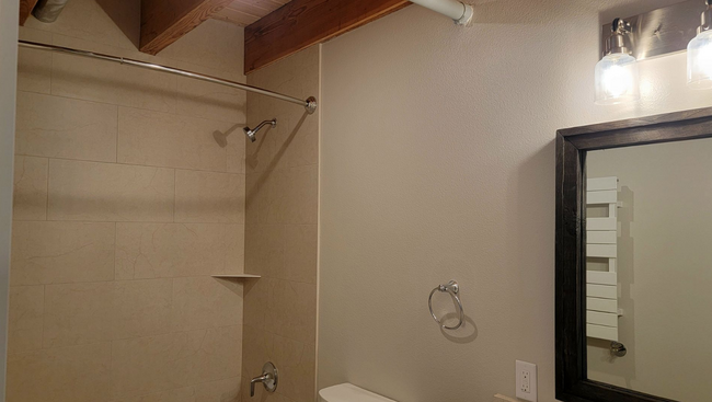 Bathroom with tiled tub/shower - 6960 SW Canyon Rd