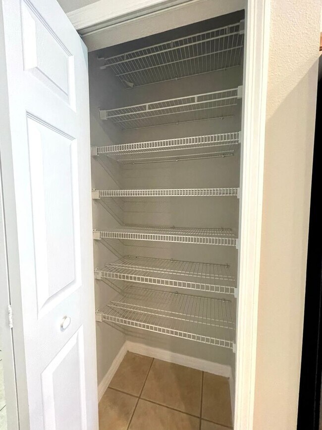 Building Photo - SOUTHEAST ORLANDO  - NICE UPGRADED HOUSE IN TIVOLI WOODS VILLAGE