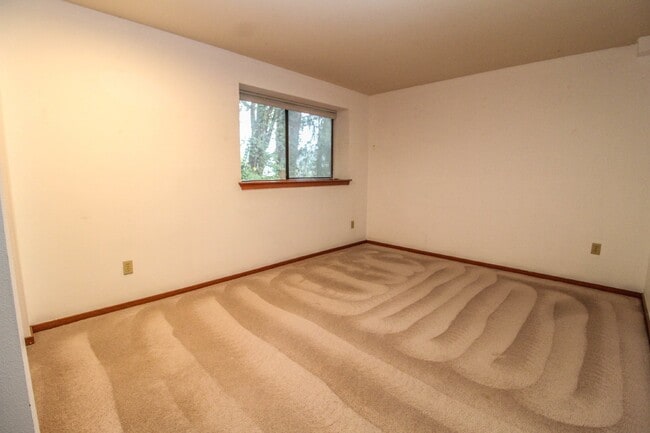Building Photo - Spacious 4-Bedroom Home with Stunning Lake...