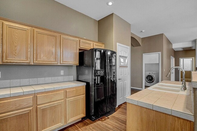 Building Photo - Gorgeous NW Single Story! 3 Car Garage! Serene Backyard.