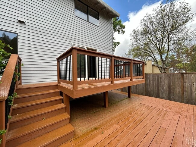 Building Photo - Beautiful 4BD Home | Fireplace, Fenced Backyard, Deck, Garage & A/C