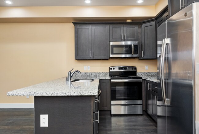 Building Photo - Spacious Two-Bedroom, Two-Bath Living at Marigold Apartments — Available Now