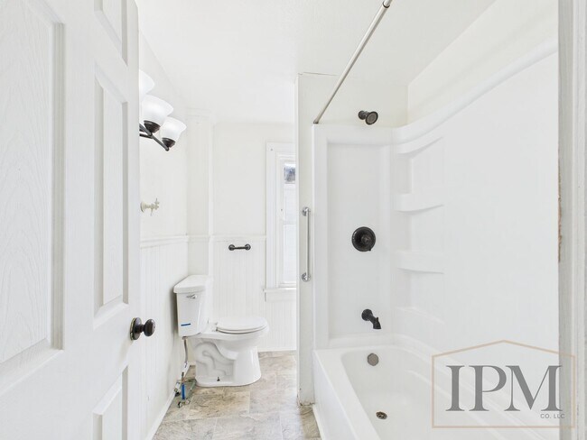 Building Photo - Available Now! Spacious 5 Bedroom Home Loc...