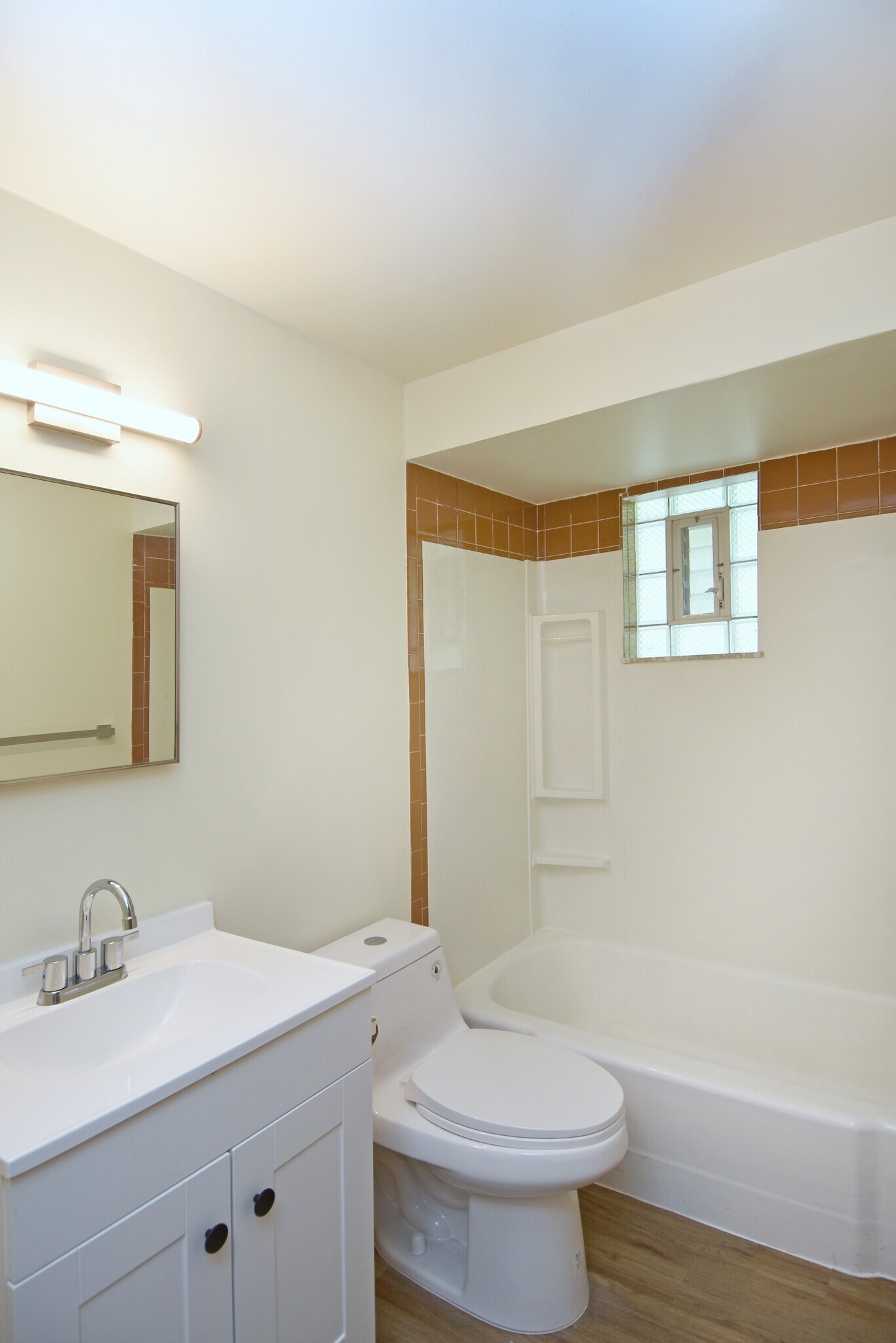 Freshly painted bathroom has all new vanity with new faucet fixtures, new toilet, new LED lighting a - 3156 Glendale Ave