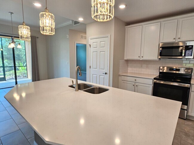 Building Photo - Annual Unfurnished 2 Bedroom 2 Bathroom First Floor Condo with 1 Car Garage in Sarasota National!