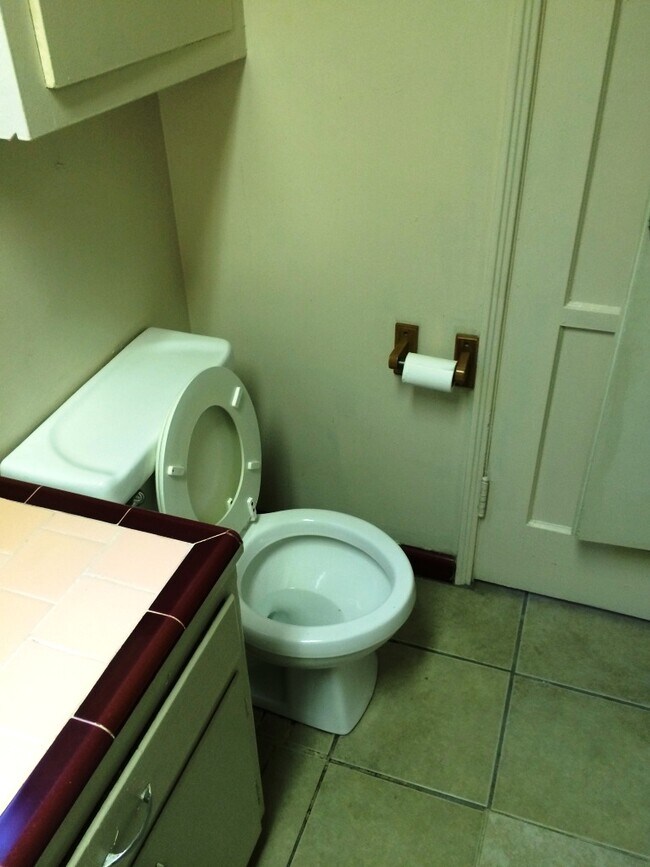 private bathroom with commode - 5646 Farmdale Ave