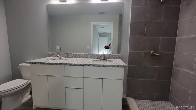 Building Photo - 7043 N Outrigger Terrace