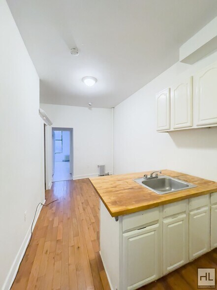 Building Photo - 2BR 2BA Private Backyard On Bushwick/Ridgewood Border