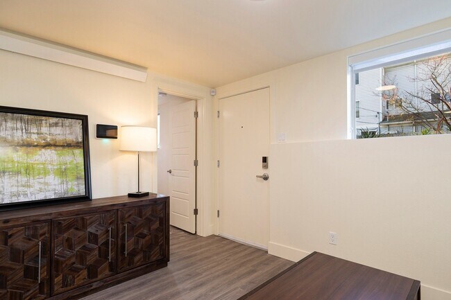 Building Photo - Ballard Gem! Updated Apartment w/ Parking, Bright Interiors & Steps to Dining + Parks