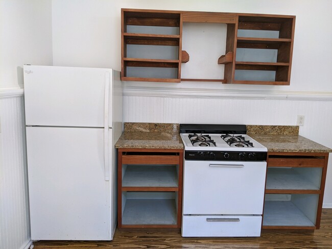 Fridge, marble counters, hand made cabinets + gas stove - 2214 Valence St