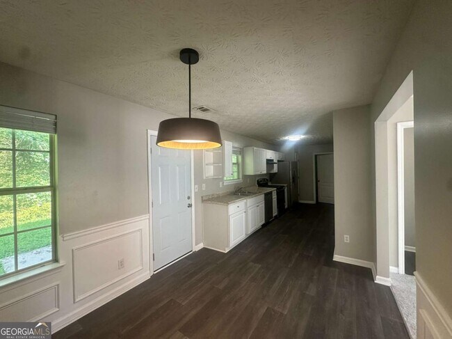 Building Photo - 7467 Petunia Dr