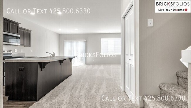 Building Photo - Your Dream Home in Puyallup – Where Peace ...