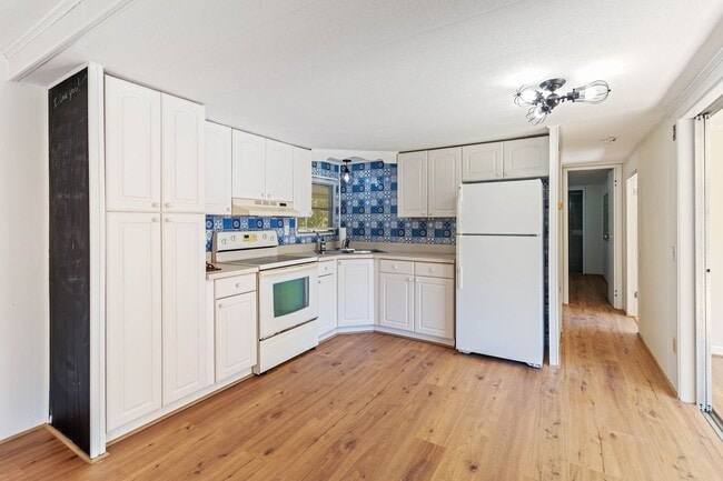 Building Photo - Charming 2BR/2BA Waterfront Home for Rent ...