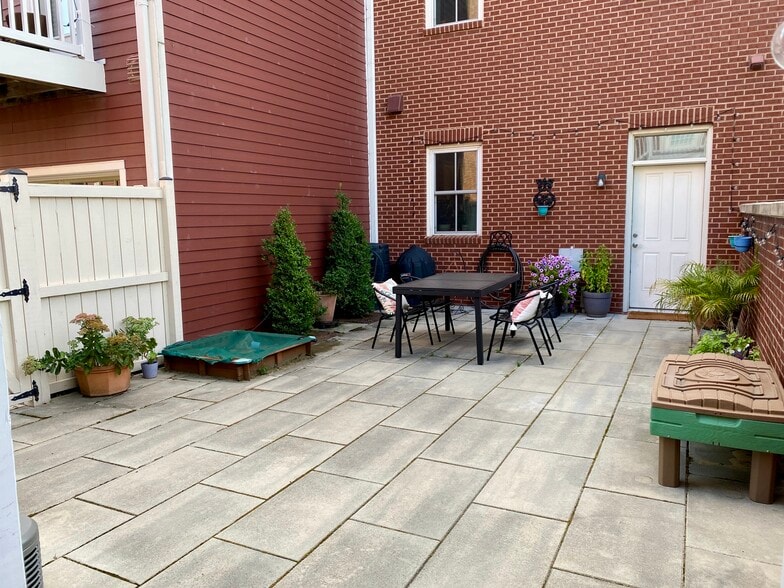 Shared patio space. - 2115 Main Line Blvd