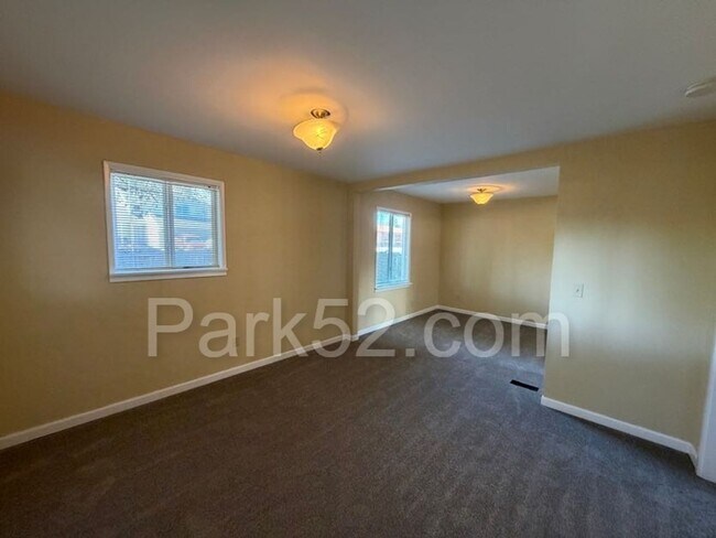 Building Photo - 5502 27th St NE