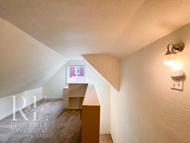 Building Photo - Private Retreat with Expansive Yard & Loft Space