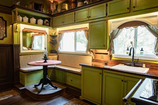 Building Photo - Move-In Ready One-of-a-Kind Custom Cabin Retreat with Loft, Deck, and Designer Interior Charm