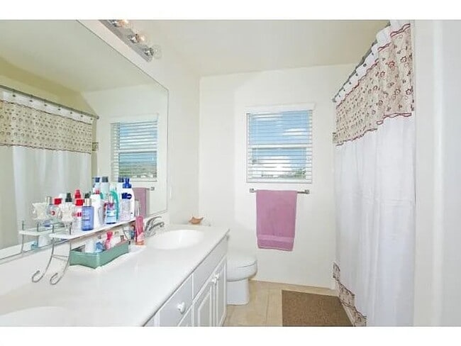 Building Photo - A stunning two-story house boasts three spacious bedrooms and 2.5 bathrooms