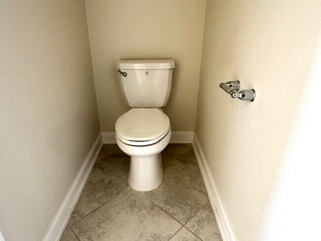 Building Photo - For Rent in ChampionsGate 3/2.5 Townhouse with Water View