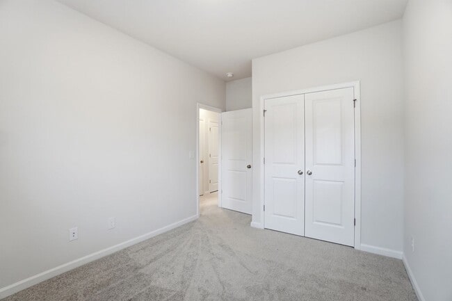 Building Photo - Brand-new three-story townhome in the University area at Senata at Research Park!