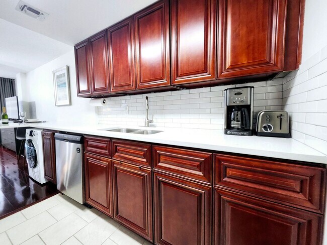 Building Photo - Modern Downtown Living with Comfort, Security & Style