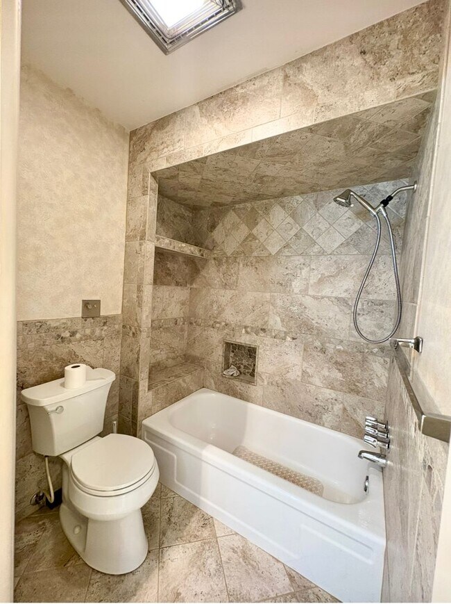 Building Photo - Beautifully Updated Condo in a Gated Activ...