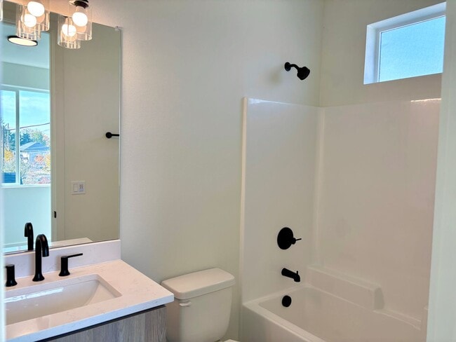 Building Photo - St. Johns New Build - Bright and Spacious End Unit 2 Bedroom with A/C, Washer/Dryer and Private P...