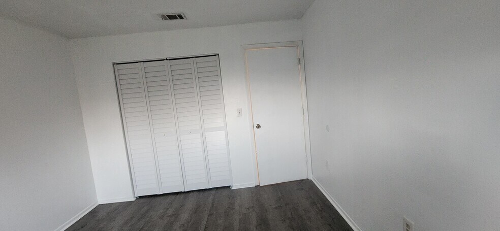 New doors for closet in bedroom 1 - 1552 University Ln