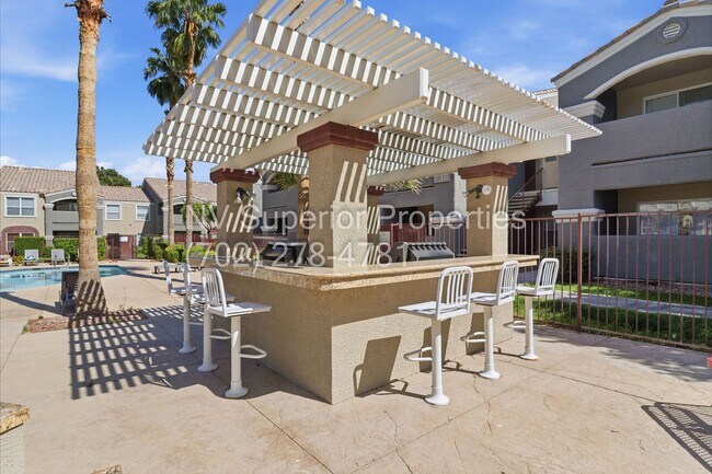 Building Photo - SW!! First floor unit with Balcony!! Gated!! Clubhouse!!  Community pool!! Spa!! Exercise Room!! ...