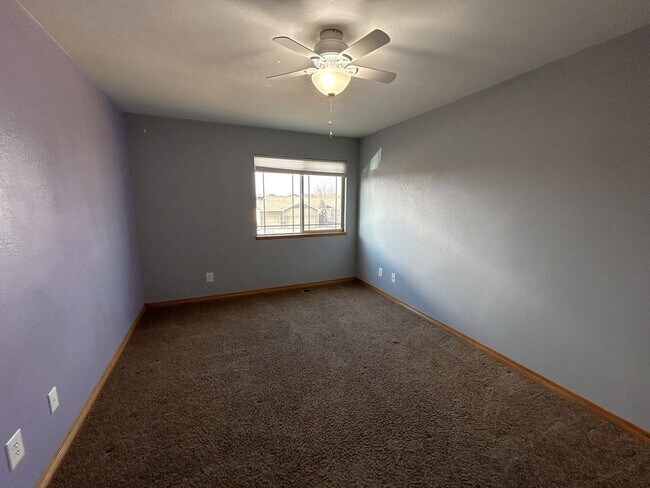 Building Photo - Spacious 5-Bedroom Home with Finished Basement and 3-Car Garage in Wellington