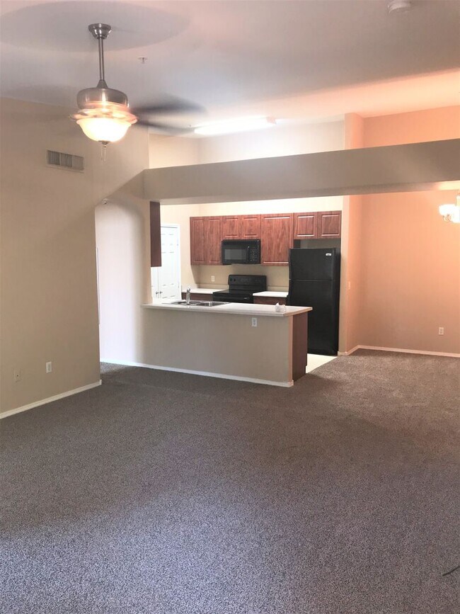 Building Photo - **SPECTACULAR - 2BEDROOM/2BATHROOM/1GARAGE/GATED CONDO (SOUTHERN & CRISMON)**