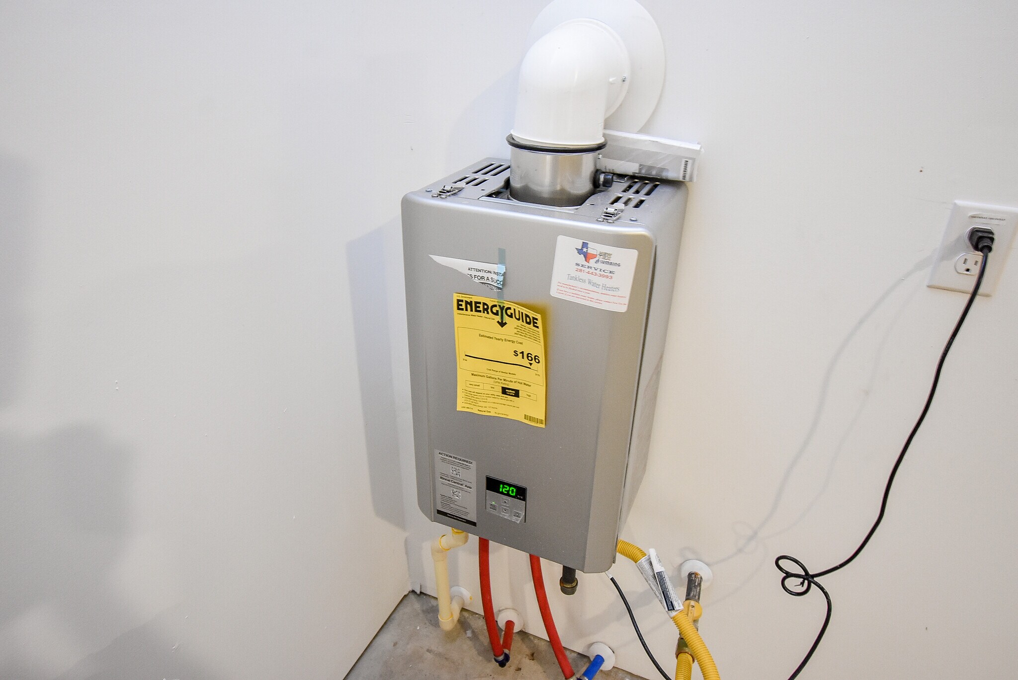 Tankless water heater - 6714 Iron Clover Dr