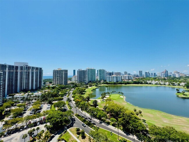 Building Photo - 3675 N Country Club Dr