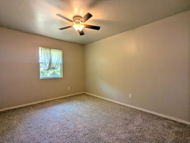 Building Photo - Charming OKC Home | 3 Bedrooms, 2-Car Garage & Spacious Fenced Backyard!