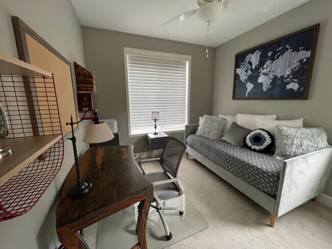 Second bedroom office. Desk has basic supplies. - 1410 Promontory Bluff Vw