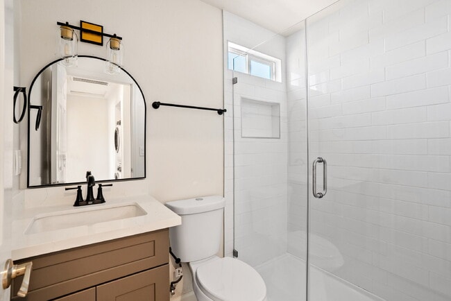 Building Photo - AVAILABLE AUGUST - Coastal-Convenient 2 Bed Retreat with Private Balcony