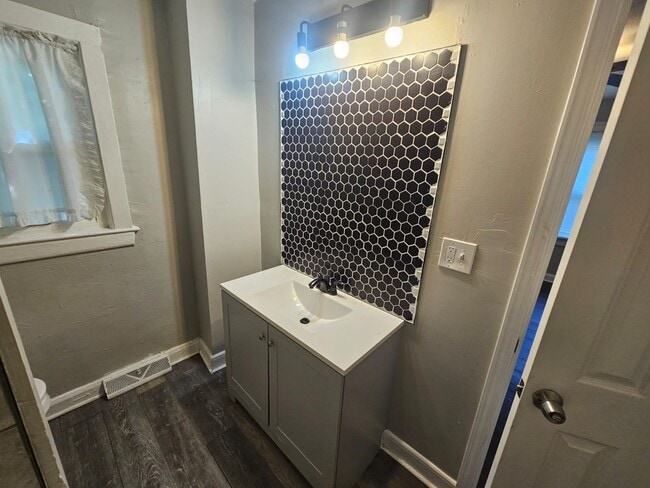 Building Photo - Spacious 4-Bedroom Cleveland Home with Updated Flooring & 2-Car Garage
