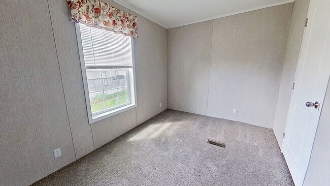 Building Photo - Move-In Ready Mobile Home with Upgrades!