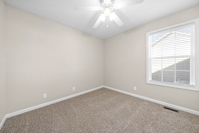 Building Photo - Pet Friendly Three Bedroom with Bonus!